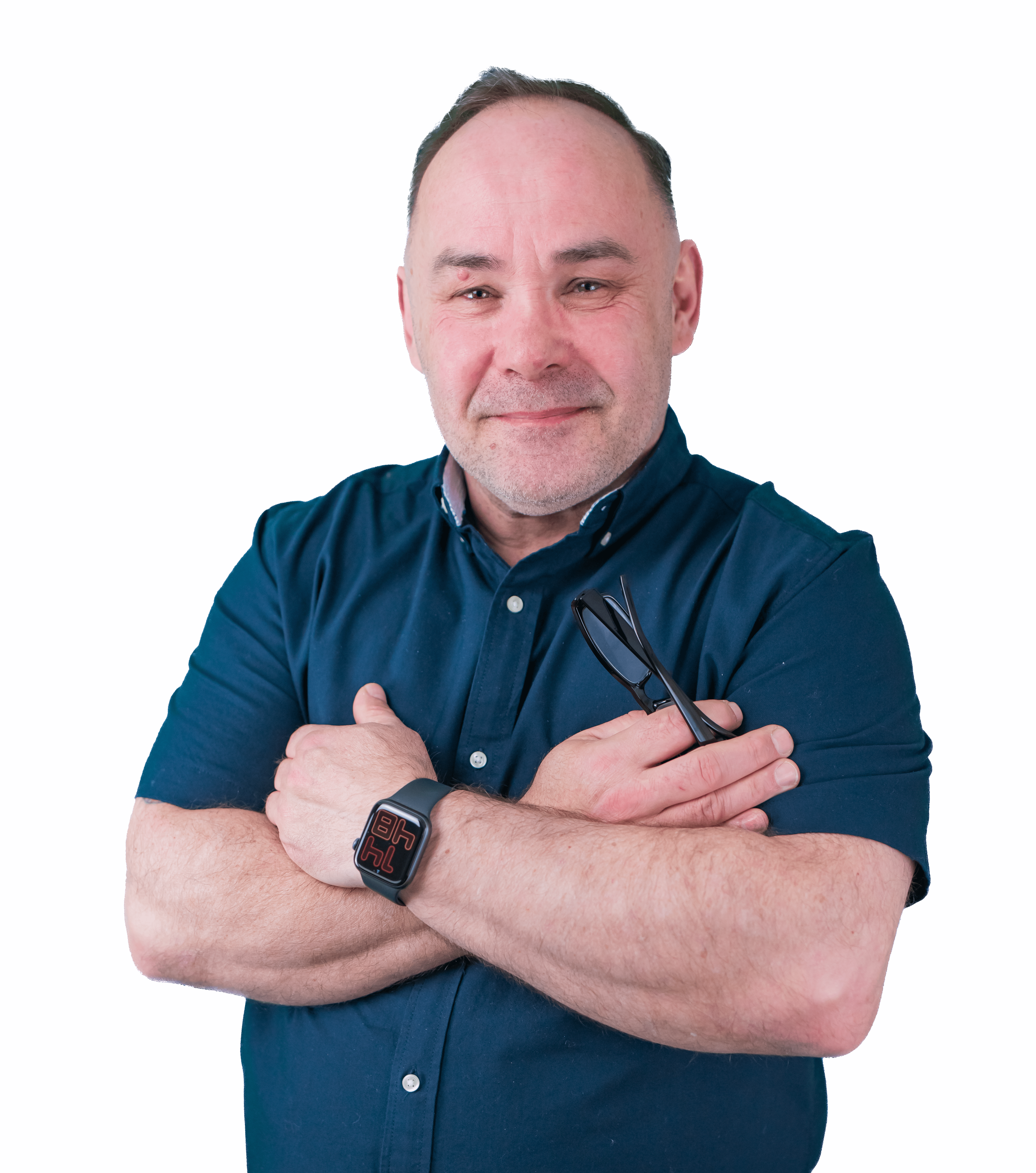 A man with his arms crossed and wearing a watch.